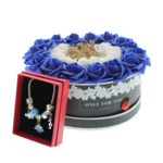 Blue floral arrangement with foam roses and charm bracelet 4