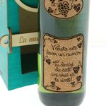 Personalized bottle in a green box with a number 6